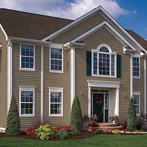 Front view of a generic home with brown CertainTeed siding