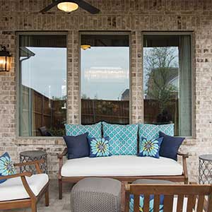 Close up of MI windows in an outdoor area behind a sitting area